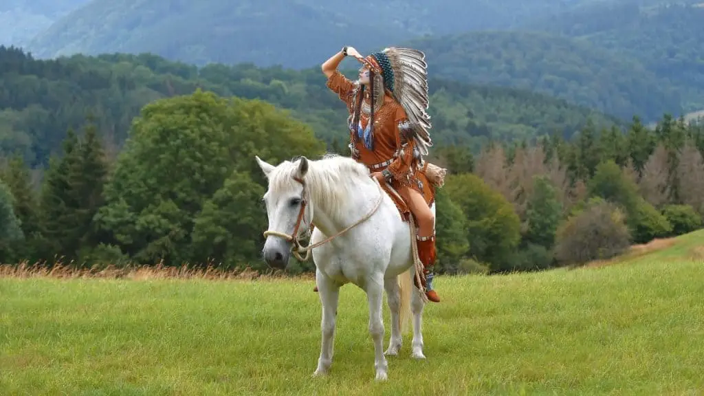 Cherokee Riding A Horse